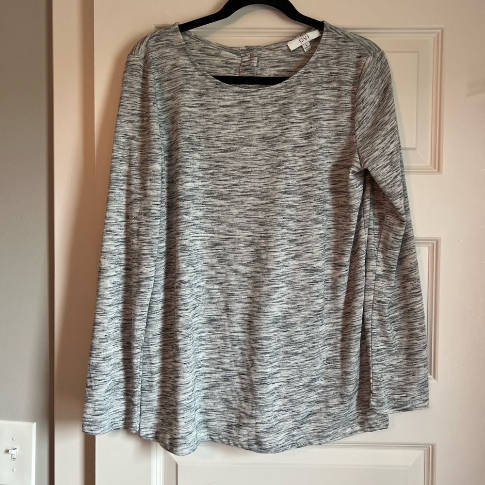 Worn once. Gray longsleeve with buttons on back. Large